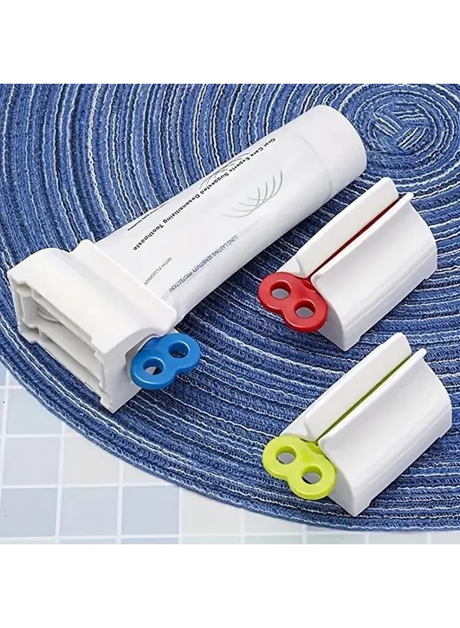 Blue Manual Lever Toothpaste Dispenser Hands Free Hygienic Squeezer Holder - Image 1
